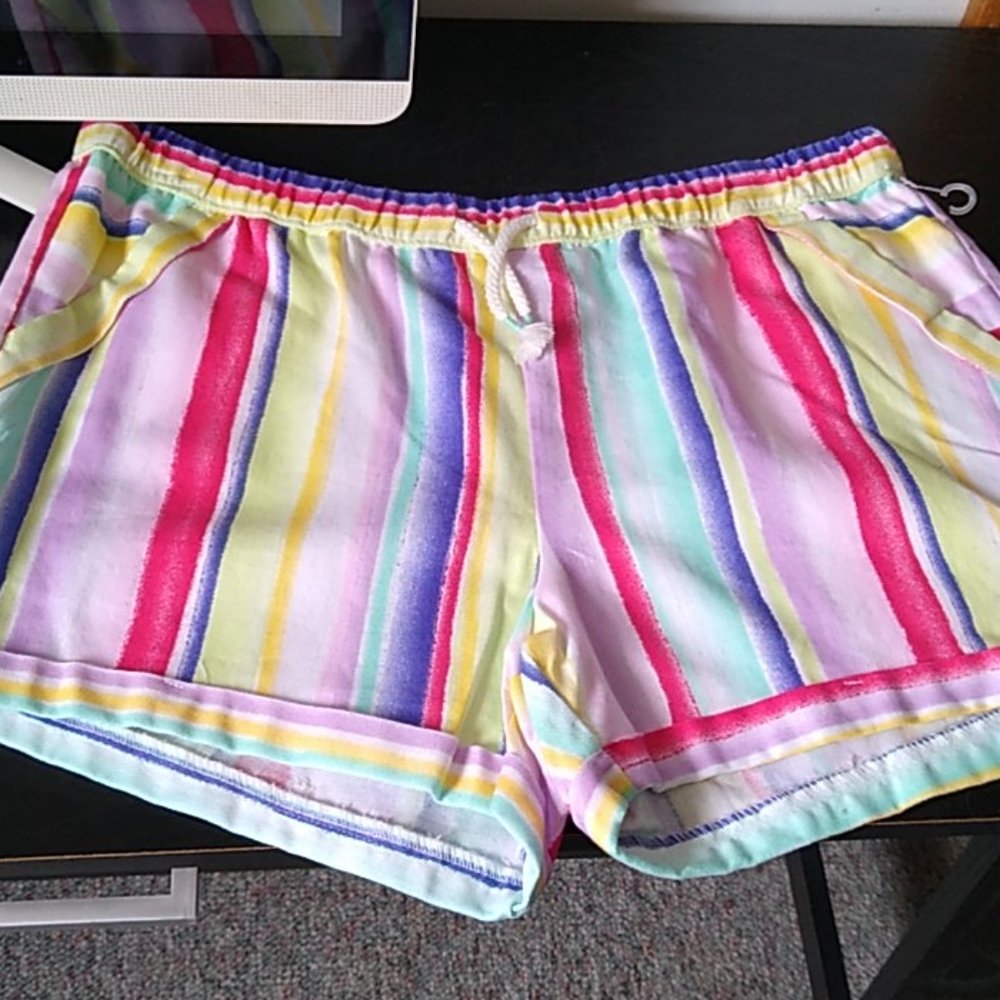 Girls pull on shorts